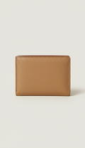 Champagne leather trifold wallet